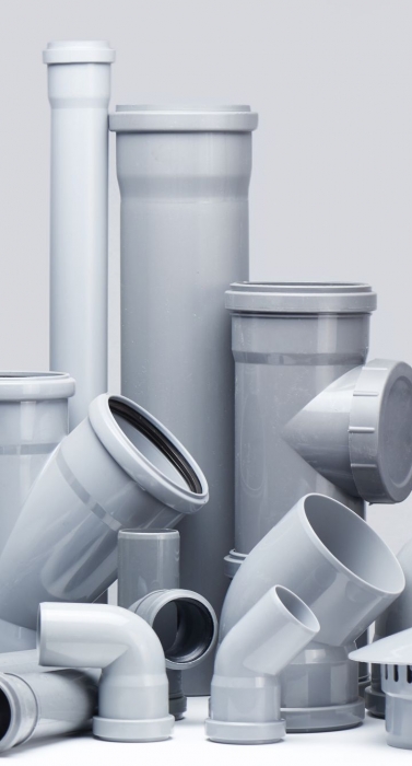 Plumbing, sewage. Gray polypropylene tubes on a white background in futuristic style