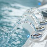 closeup of jet of water in swirl bath